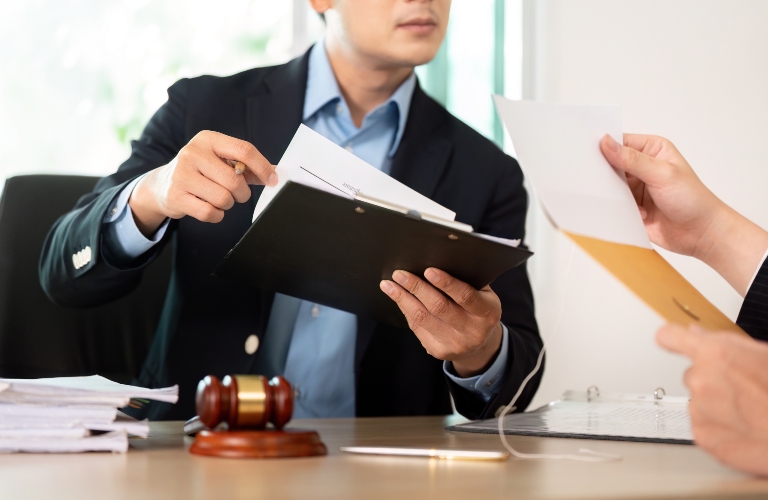 Lawyer discussing case details with client in modern office